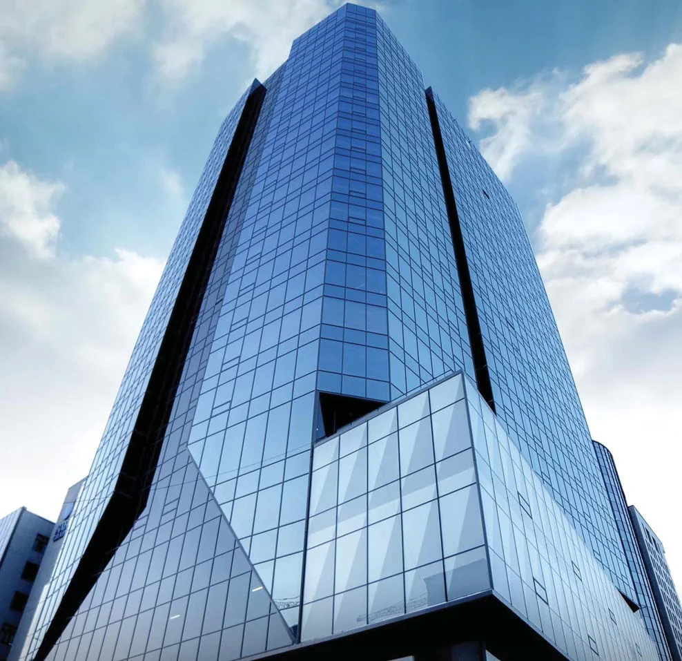 A wide view of Minister Tower's glazed façade